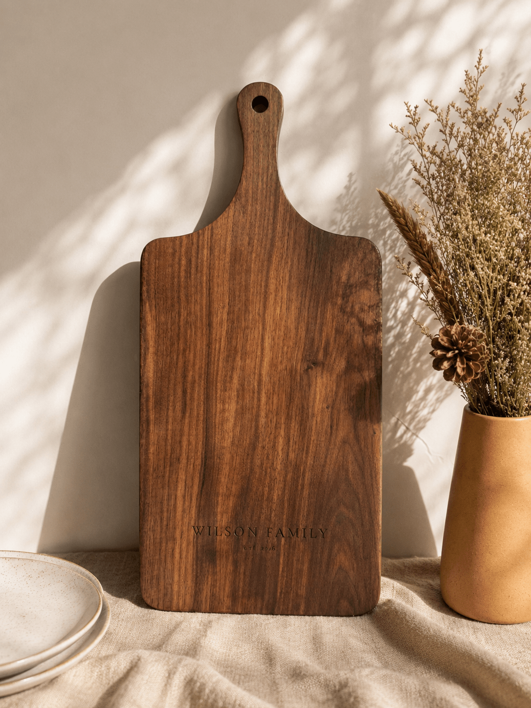Personalized walnut cutting board engraved as a wedding gift