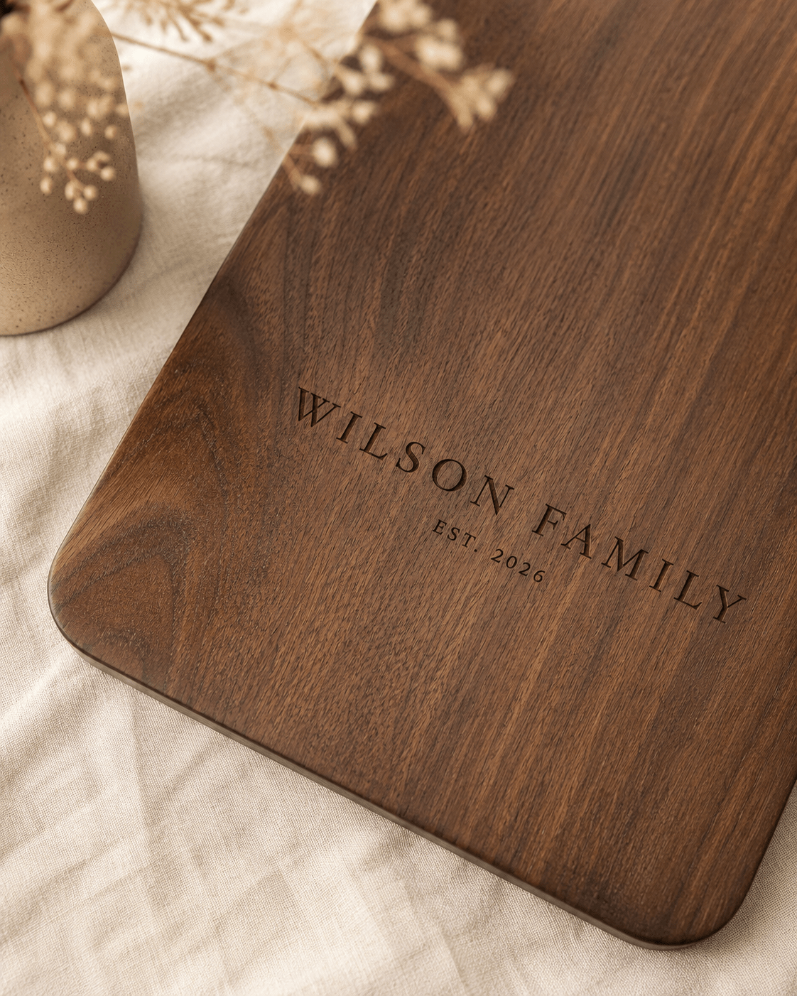 Large walnut cutting board with custom family name engraving