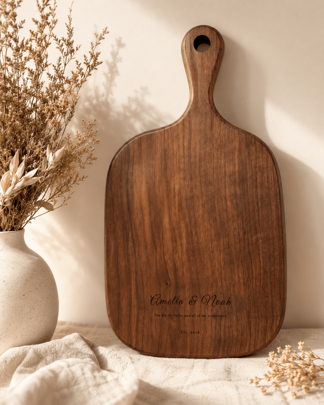 Custom walnut cutting board personalized for weddings and families