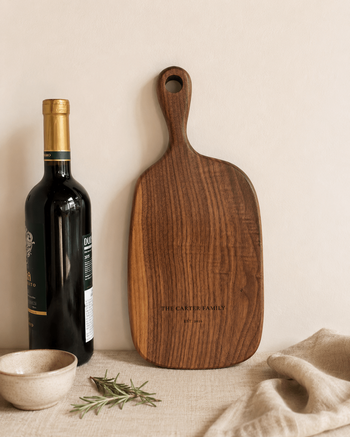 Compact engraved walnut serving board for housewarming gifts